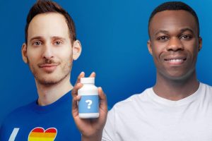 Andrew and Patient holding 2 medication bottles